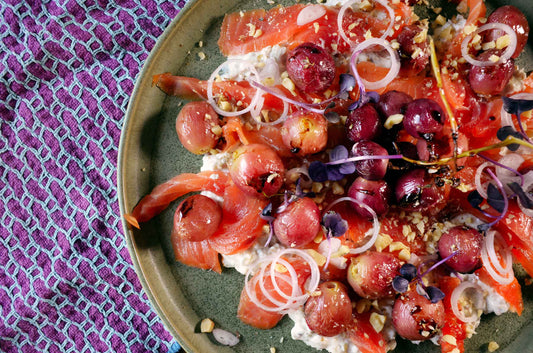Smoked trout on walnut cream and grapes